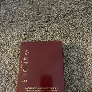 Wander Baggage Claim gold eye mask